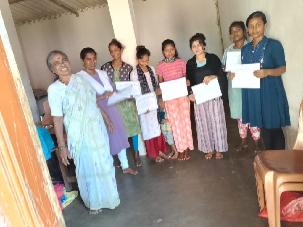 Smiling Tailoring School Graduates with Course Certificates